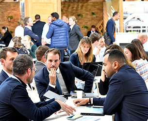 Visitors and exhibitors on a Siec stand